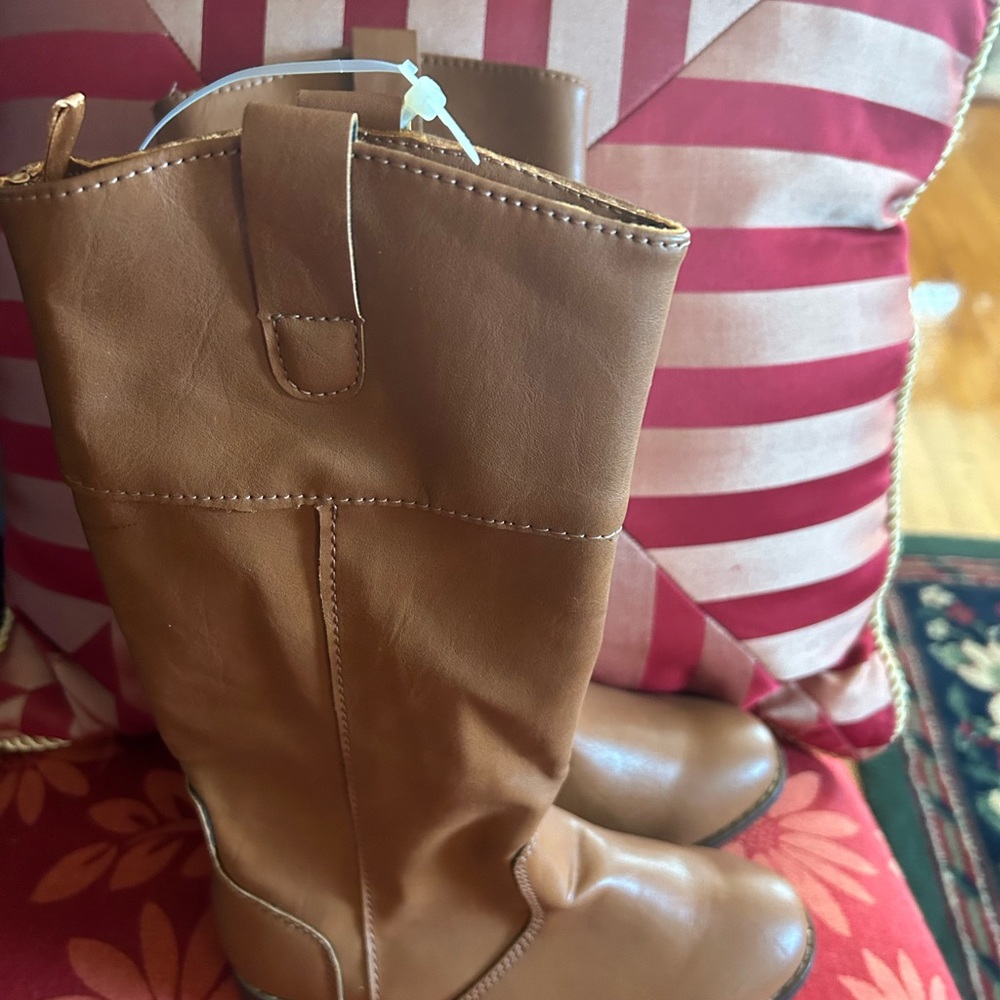 Brand new Small girl’s tan tall boots.